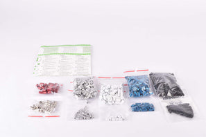 Batch of NOS Nokon spare Konkavex parts in different colors and sizes