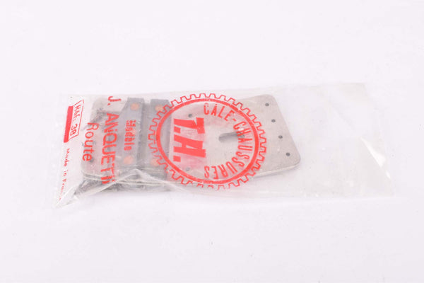 NOS Spécialités TA Shoe Cleats #ref.38 J. Anquetil Route nail-on shoe cleats from the 1960s - 1980s