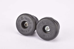 Black fujita saddle screw tight / screw on expandable handlebar end plugs from the 1970s
