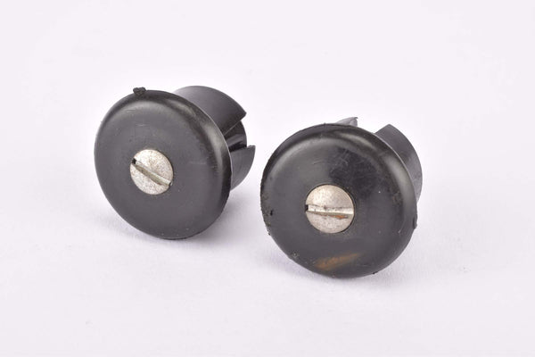 Black screw tight / screw on expandable handlebar end plugs from the 1970s