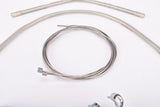 NOS clear Silver Shimano NEW 600 EX / 105 Golden Arrow gear shifting cable set including housing and guides from the 1980s