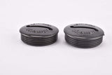 NOS Ofmega black plastic crank dust cap from the 1980s