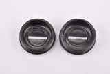 NOS Ofmega black plastic crank dust cap from the 1980s