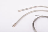 NOS clear Silver Shimano NEW 600 EX / 105 Golden Arrow gear shifting cable set including housing and guides from the 1980s