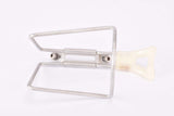 White REG #1975/50 Dural aluminum alloy water bottle cage from the 1970s - 1980s