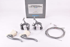 NOS/NIB Shimano 600 Ultegra #BL-6403 and #BR-6403 Brake Caliper and Lever set (Dual Pivot Brakes and aero brake lever set with white hoods) from the 1990s