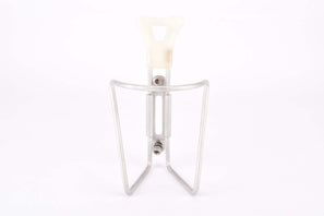 White REG #1975/50 Dural aluminum alloy water bottle cage from the 1970s - 1980s