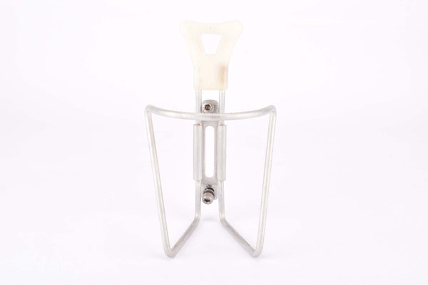 White REG #1975/50 Dural aluminum alloy water bottle cage from the 1970s - 1980s