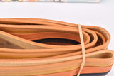 NOS/NIB Vittoria Pro-Team Open Dry Road Orange and Black Skinwall folding single Tire (clincher) in 20-622mm (28" / 700x20C) from the 1990s - 2000s