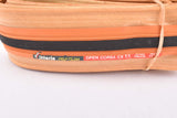 NOS/NIB Handmade Vittoria Pro-Team Open Corsa CX T.T. Orange and Black Skinwall folding single Tire (clincher) in 23-622mm (28" / 700x23C) from the 1990s - 2000s