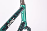 Metallic green and black Jan Janssen Vuelta mixte Ladys frame set with glossy liquid spot effect paint in 54 cm (c-t) with H.R.3 tubing from the early 1990s