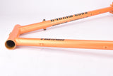 Orange Koga-Miyata Gents-Luxe-S road bike frame set in 58 cm (c-t) / 56.5 cm (c-c) with Koga-Miyata Champion and Hi-Manga tubing by Tange and Shimano dropouts  from 1980