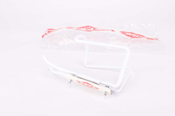 NOS White REG Italy water bottle cage from the 1980s / 1990s