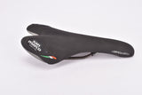 NOS Black Selle San Marco Era Saddle with Titanium Rails from 2004 - Rennrad Sattel

Weight / Gewicht :
240 g

Rail spacing / Gestellbreite :
44 mm

Condition / Zustand :
New old stock (NOS), see pictures /
Neue alte Lagerware, siehe Bilder

Production date / Produktionszeitraum :
1990s - 2000s / 1990er - 2000er

Please note / Bitte beachten :
Rear plastic cover which is holding the saddle cover in place has some small cracks near the screws, also the glue on the underside has dried out a little, this does 