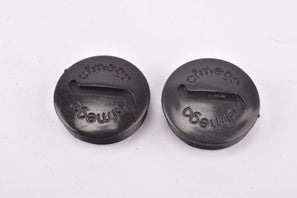 NOS Ofmega black plastic crank dust cap from the 1980s