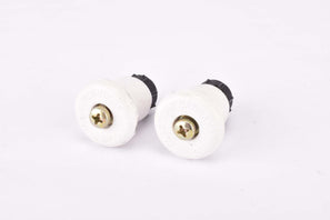NOS White Plastiche Cassano adjustable screw on / screw tight expandable rubber handlebar end plugs from the 1970s