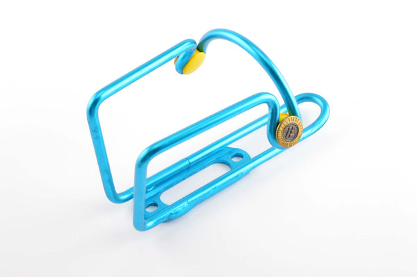 NEW blue anodized Elite Ciussi Light Weigth Tubular Alu water bottle cage from 1990s NOS