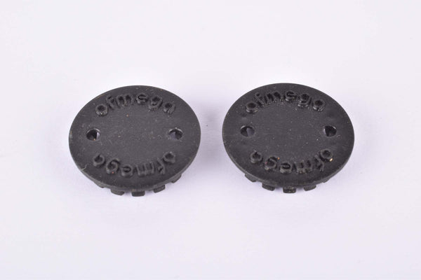 Black Ofmega plastic crank set dust caps