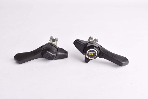 Shimano Tourney #SL-MY20 handlebar thumb 7-speed SIS gear levers from the 1980s