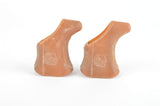NOS Campagnolo Super Record / Record / Gran Sport brown brake lever hoods with shieldlogo