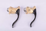 Black anodized Modolo (Speedy ?!) non-aero & aero Brake lever set with black white ergonomical hoods from the 1980s