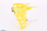 NOS Biemme  #235 yellow water bottle cage for handlebar mount from the 1970s