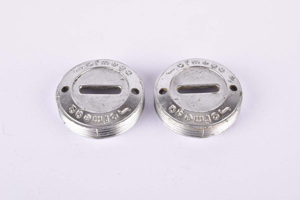 Silver Ofmega plastic crank set dust caps