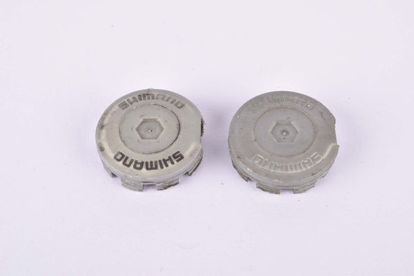 Grey Shimano plastic crank set dust caps