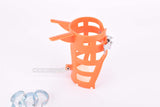 NOS Biemme  #235 orange water bottle cage for handlebar mount from the 1970s