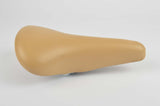 NEW Touring vinyl Saddle in creme with seatpost clamp from 1985 NOS