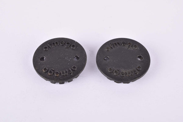 Black Ofmega plastic crank set dust caps