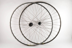 Wheelset with Wolber GTX 2 clincher rims and Shimano 105 #1050 hubs from the 1980s