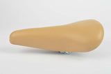NEW Touring vinyl Saddle in creme with seatpost clamp from 1985 NOS