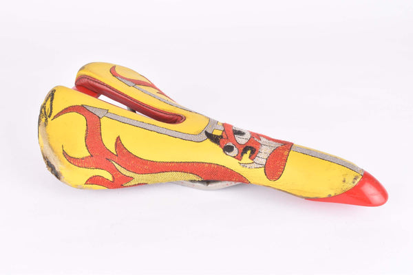 Yellow and red Selle Italia Mythos EL Diablo Saddle from the 1990s