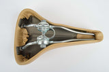 NEW Touring vinyl Saddle in creme with seatpost clamp from 1985 NOS