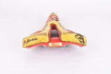 Yellow and red Selle Italia Mythos EL Diablo Saddle from the 1990s