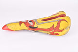 Yellow and red Selle Italia Mythos EL Diablo Saddle from the 1990s