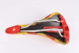 Yellow and red Selle Italia Mythos EL Diablo Saddle from the 1990s