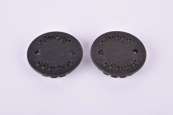 Black Ofmega plastic crank set dust caps