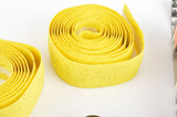 NOS/NIB Cinelli cork yellow handlebar tape with black end plugs from the 1990s