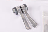 NOS Shimano Exage Light Action #SL-A400 braze-on 7-speed gear lever shifters from the 1990s