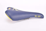 NOS Blue & Yellow / Green ish Pinarello labled Selle Italia XO Saddle from the 2000s