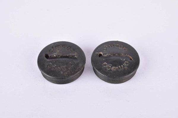 Black Ofmega plastic crank set dust caps