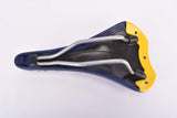 NOS Blue & Yellow / Green ish Pinarello labled Selle Italia XO Saddle from the 2000s