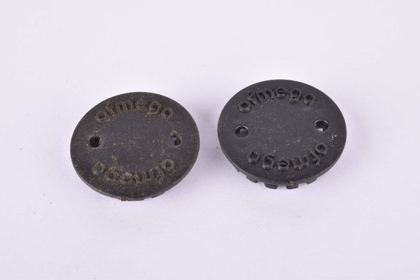 Black Ofmega plastic crank set dust caps