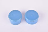 Blue Benotto handlebar end plugs