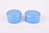 Blue Benotto handlebar end plugs
