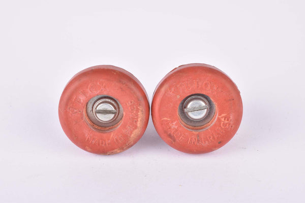 Red Velox screw on handlebar end plugs from the 1950s