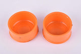 Orange Benotto handlebar end plugs