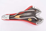 Red and White Colnago labled Selle San Marco Era Saddle with titanium rails from 2001